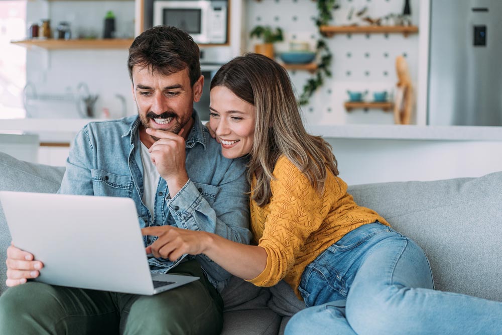 Couple applying for loan online