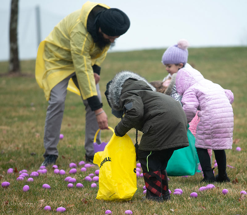 children picking up easter eggs