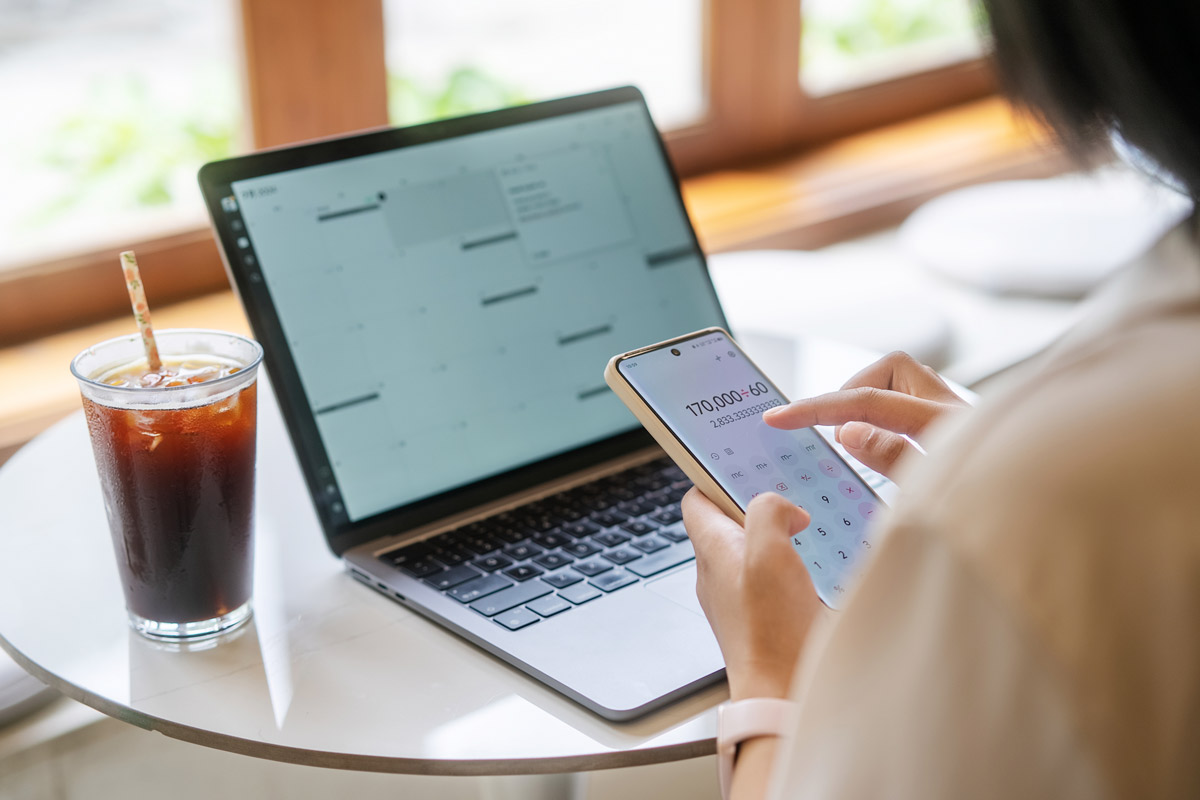 Woman at a computer plans her finances