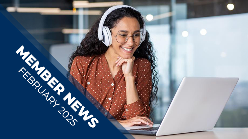 Woman on Computer with Headphones