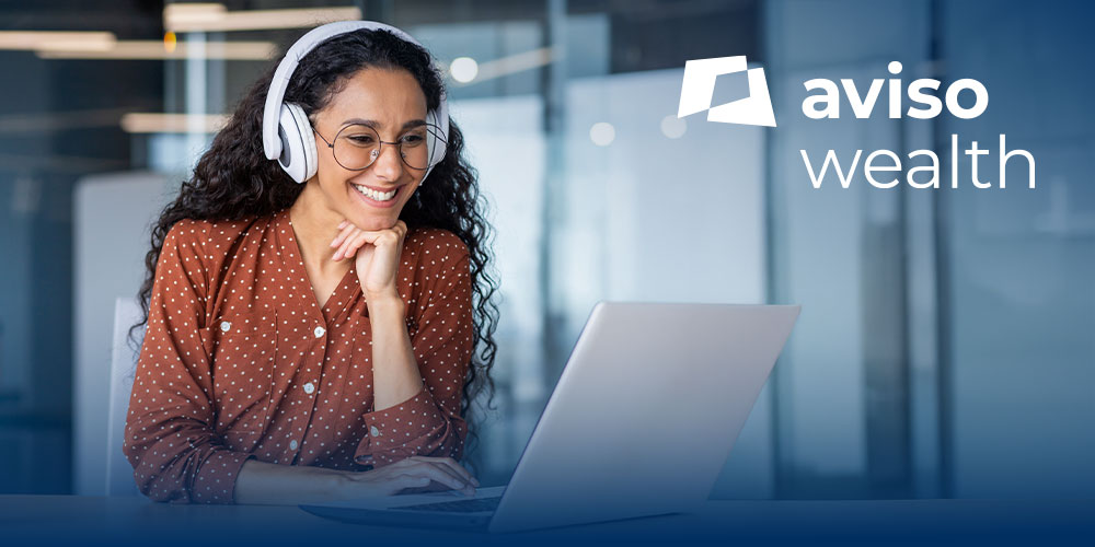 Woman on Computer with Headphones